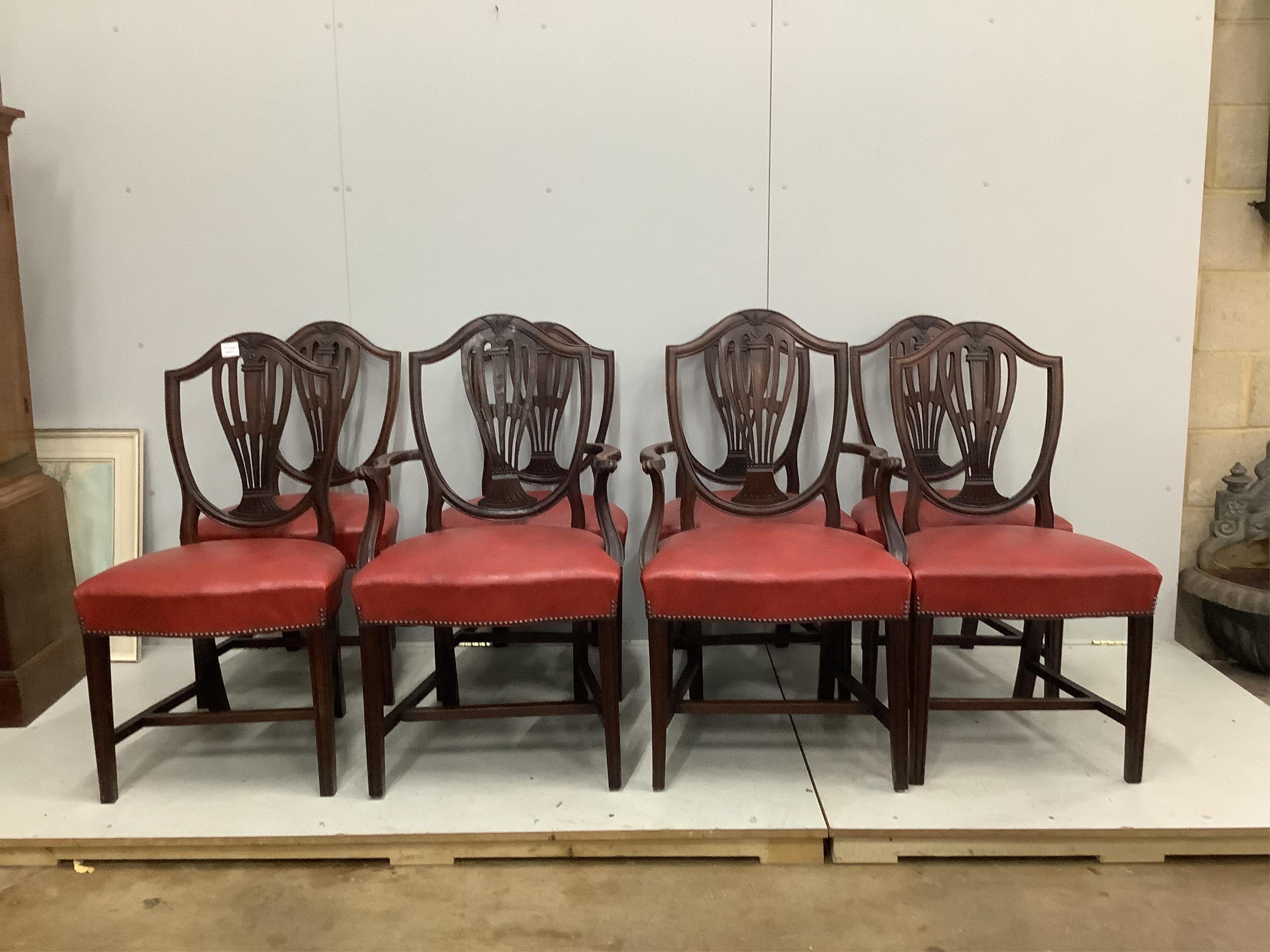 A set of eight Edwardian Hepplewhite style mahogany dining chairs, including two carvers. Condition - a little dull in finish but otherwise fair